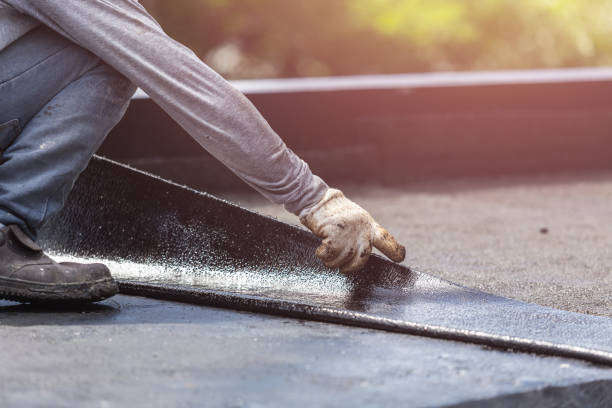 Professional Waterproofing technician working in Arlington, NY